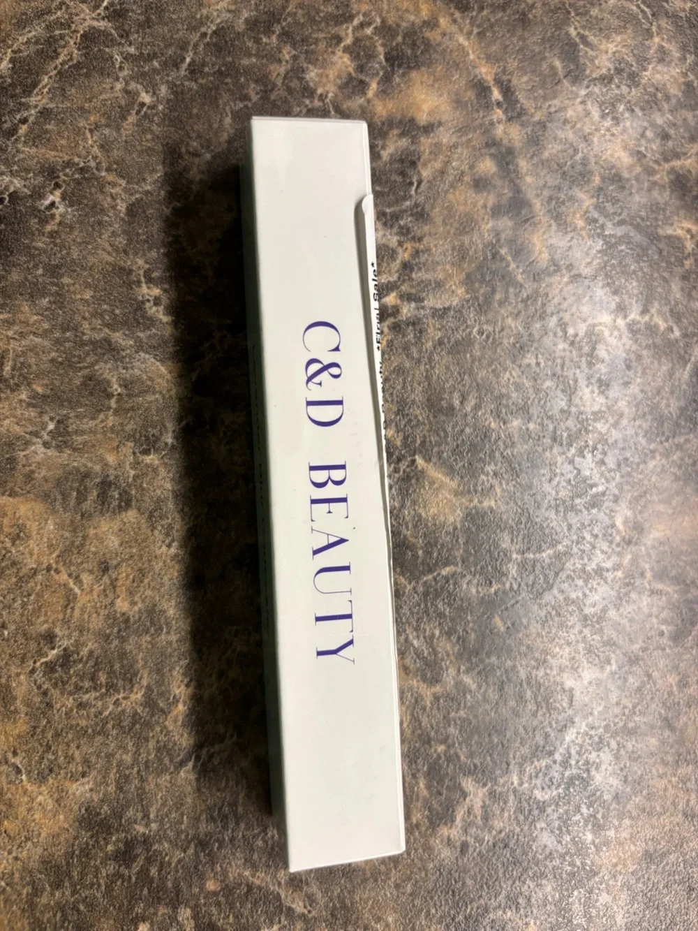 C&D Lavender Blur Concealer.